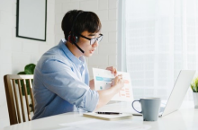 This is a photo of a man in a videoconference.